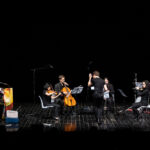Sinfonia Casalinga; Serate musicali, Teatro Bruno Munari, Teatro del Buratto.Marcello Corti direttore
Carlotta Raponi, flauto traverso
Enrico Gabrielli, clarinetto basso
Yoko Morimyo, violino. Organizzatore: Silvio Oggioni
Sinfonia CasalingaCamillo Vittorio Lepido, violoncello
Maxine Gloria Rizzotto, pianoforte
Sebastiano De Gennaro, percussioni